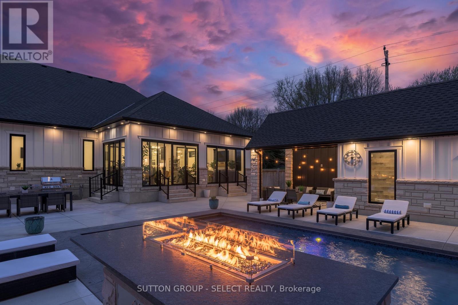 Evening with waterfall and fire feature