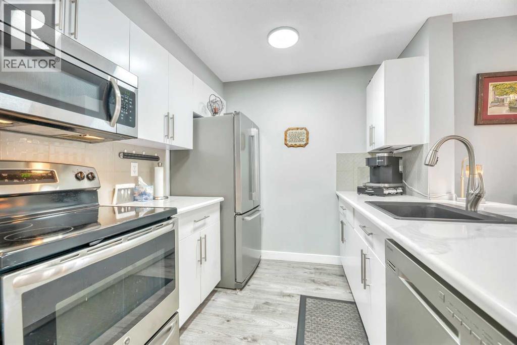 8109, 403 Mackenzie Way SW — photo 15