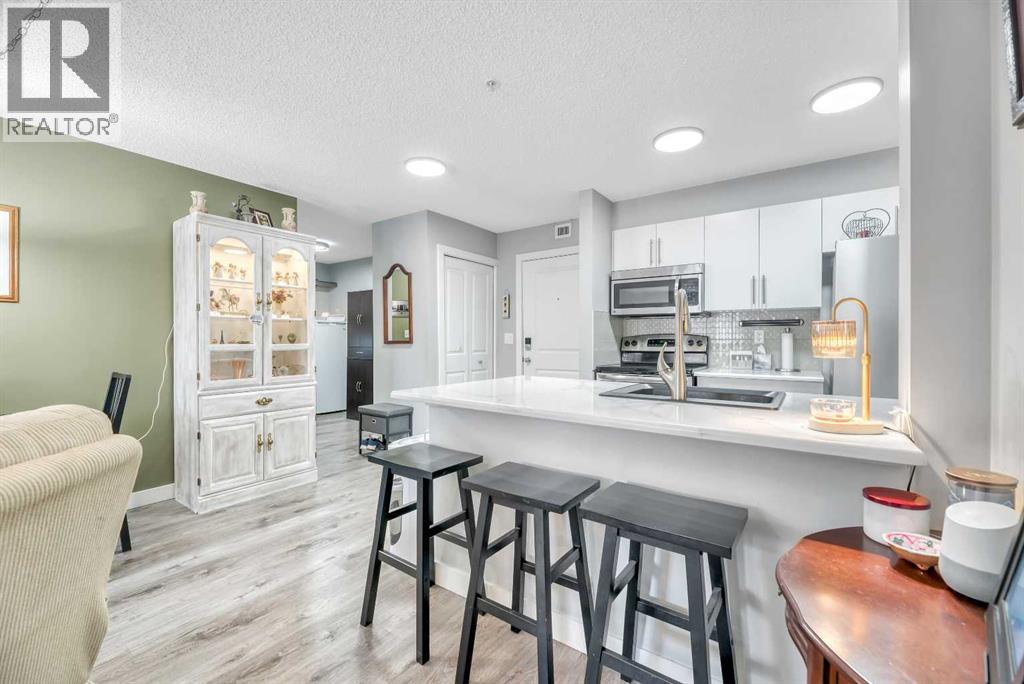 8109, 403 Mackenzie Way SW — photo 22
