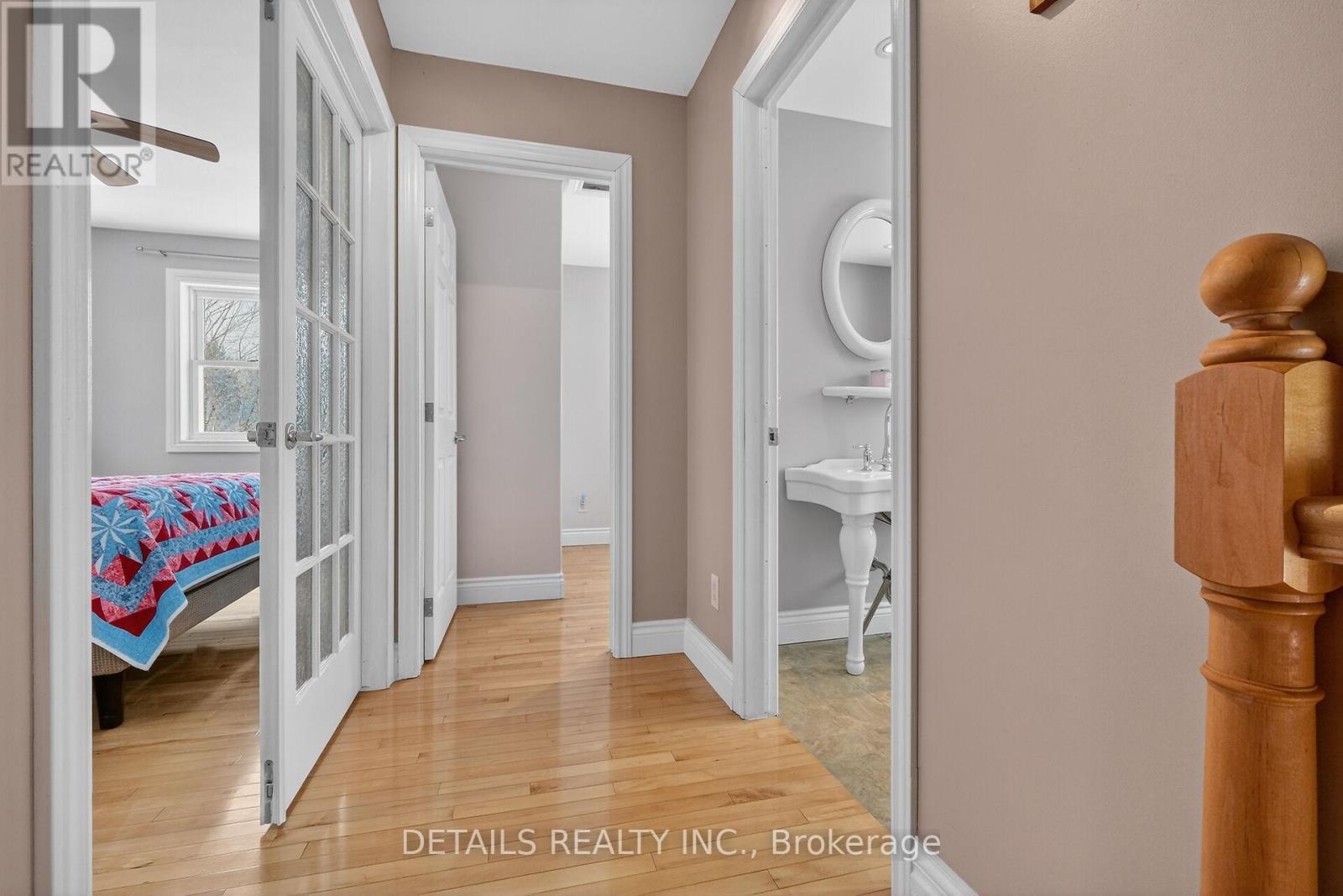 Upstairs hallway leading to both bedrooms & bath