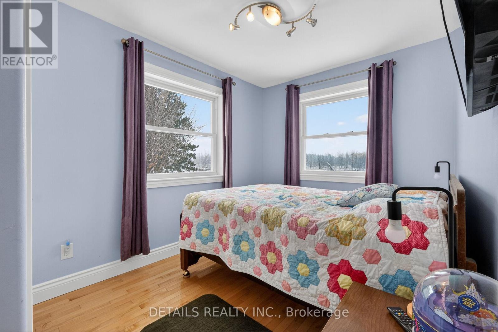 2nd bedroom- beautiful big windows throughout