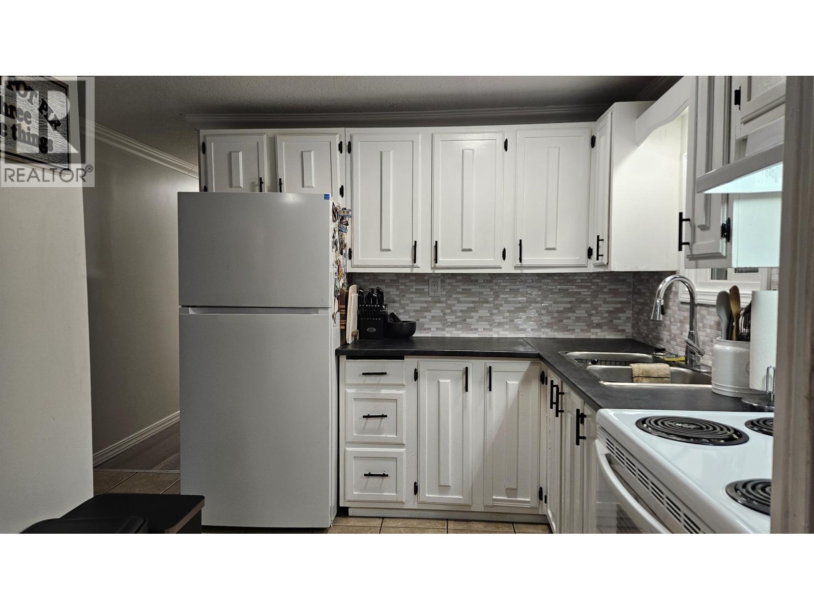 Photo 8 of 12 — A7 5931 COOK COURT · Prince George, BC