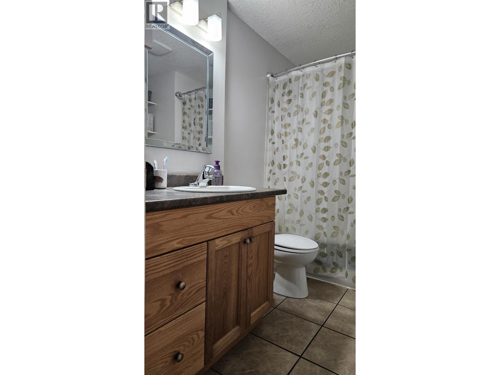 Photo 9 of 12 — A7 5931 COOK COURT · Prince George, BC