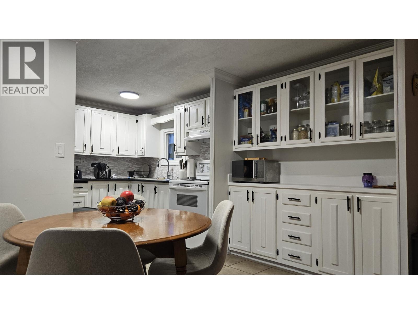 Primary bedroom of A7 5931 COOK COURT · Prince George, BC