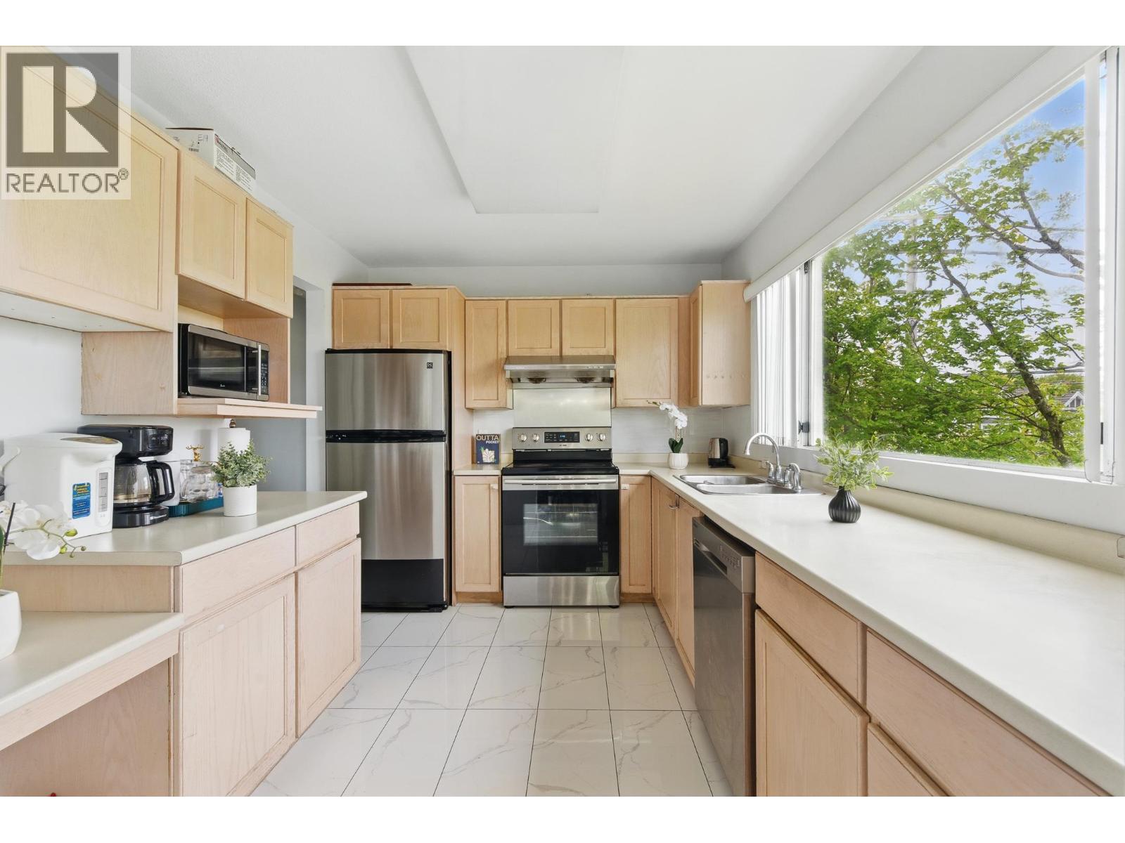 #104-7480 GILBERT Road, Richmond