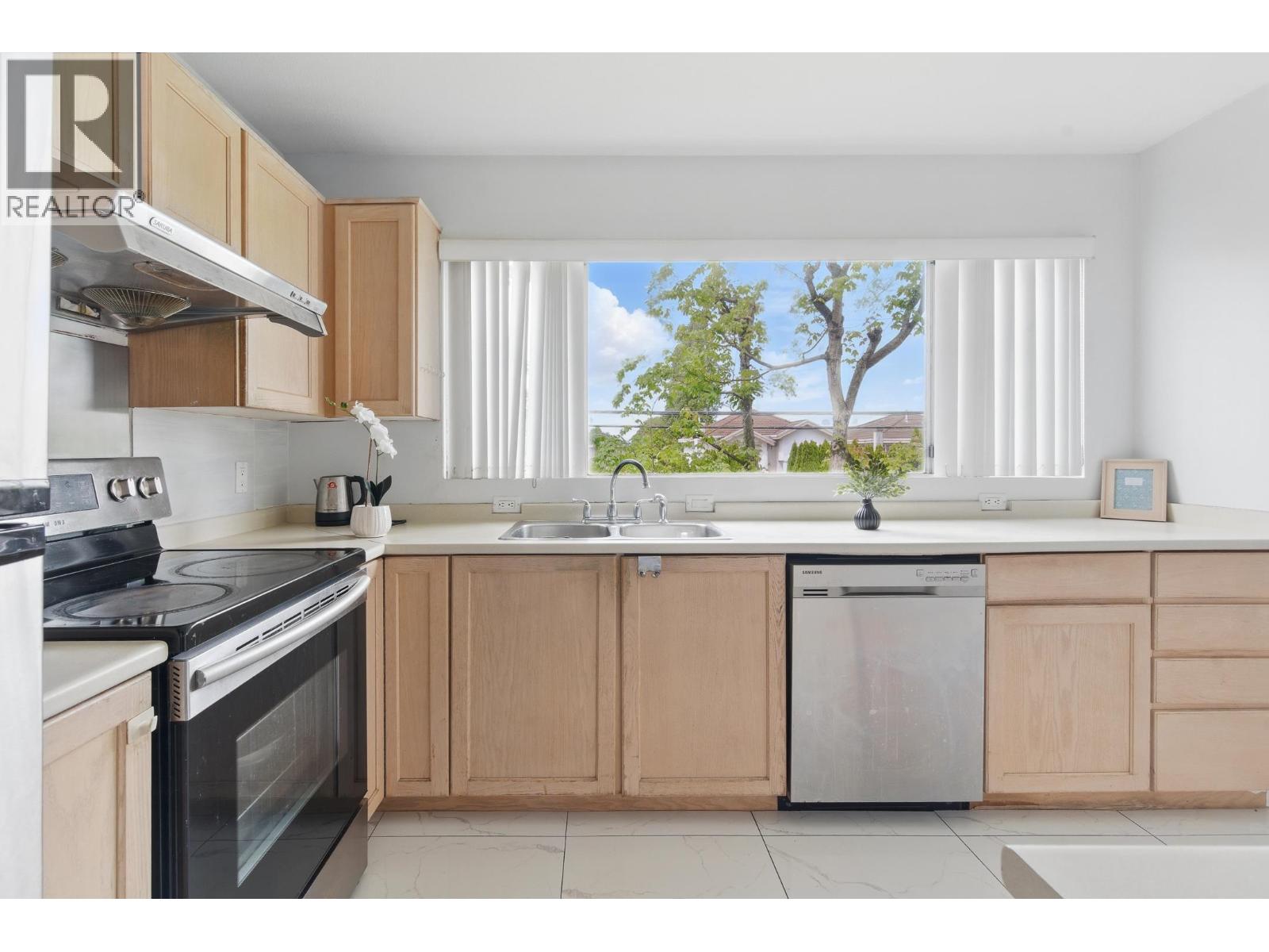 #104-7480 GILBERT Road, Richmond