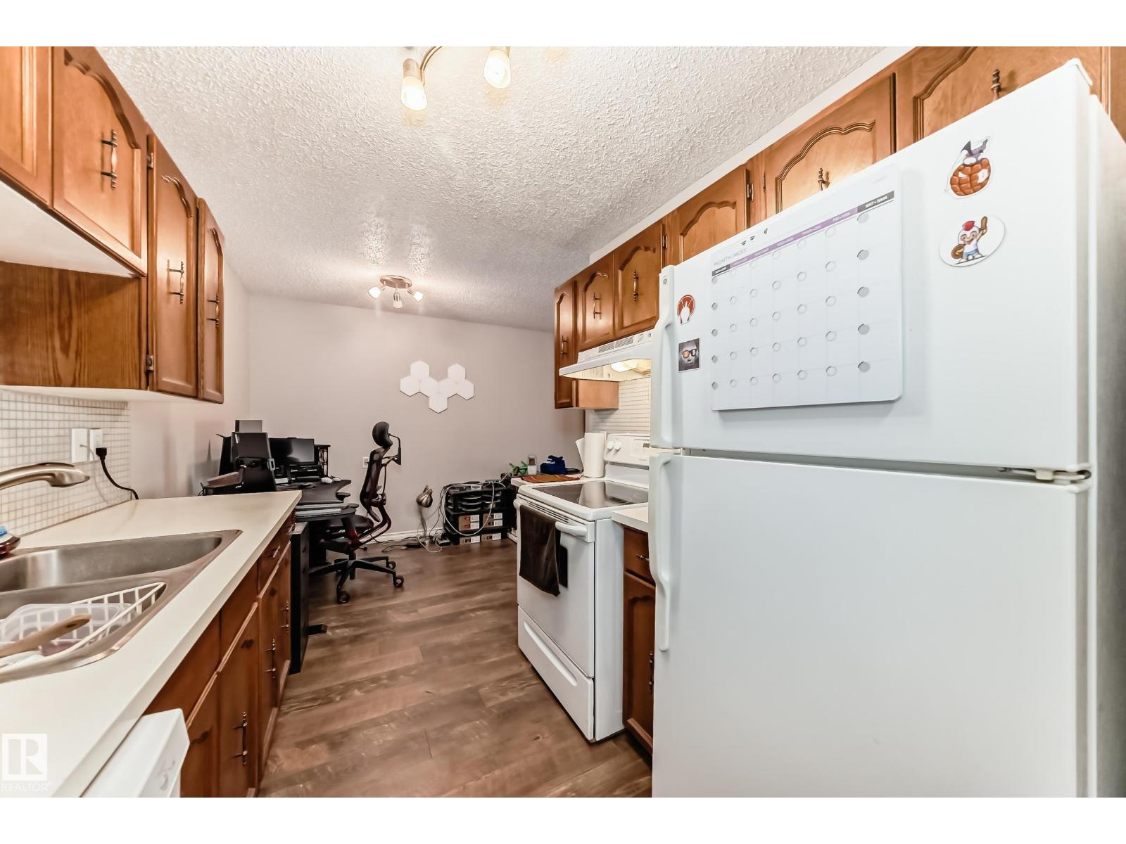 #305 14004 26 ST NW - 9