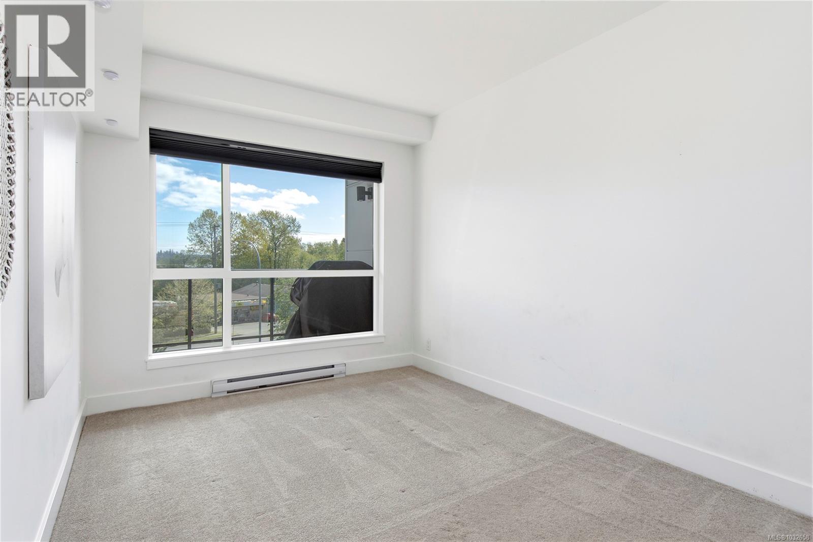 305 3070 Kilpatrick Ave — photo 19
