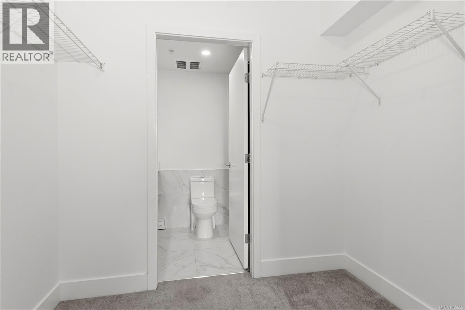 305 3070 Kilpatrick Ave — photo 22