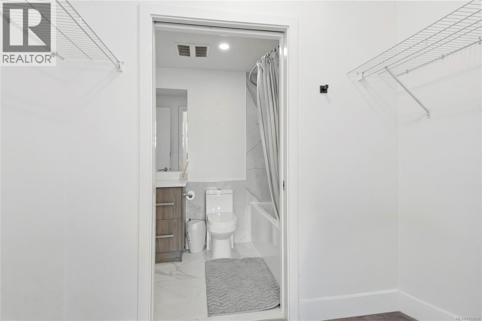 305 3070 Kilpatrick Ave — photo 17