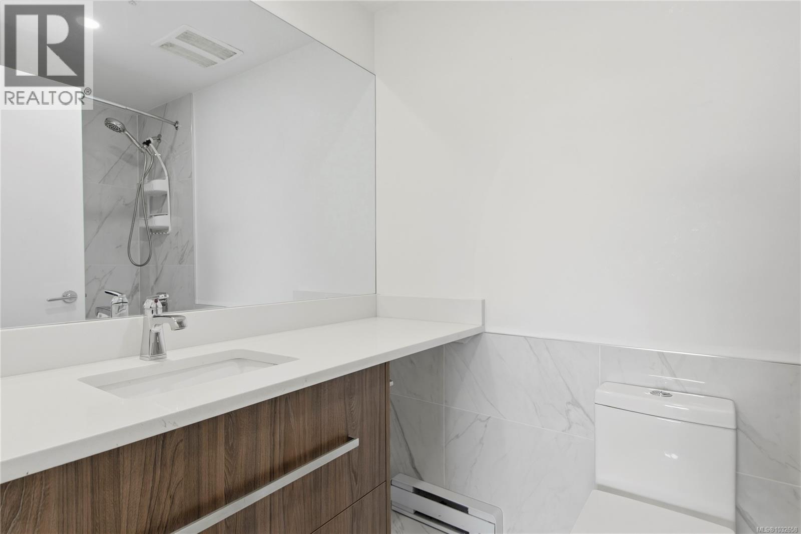 305 3070 Kilpatrick Ave — photo 23