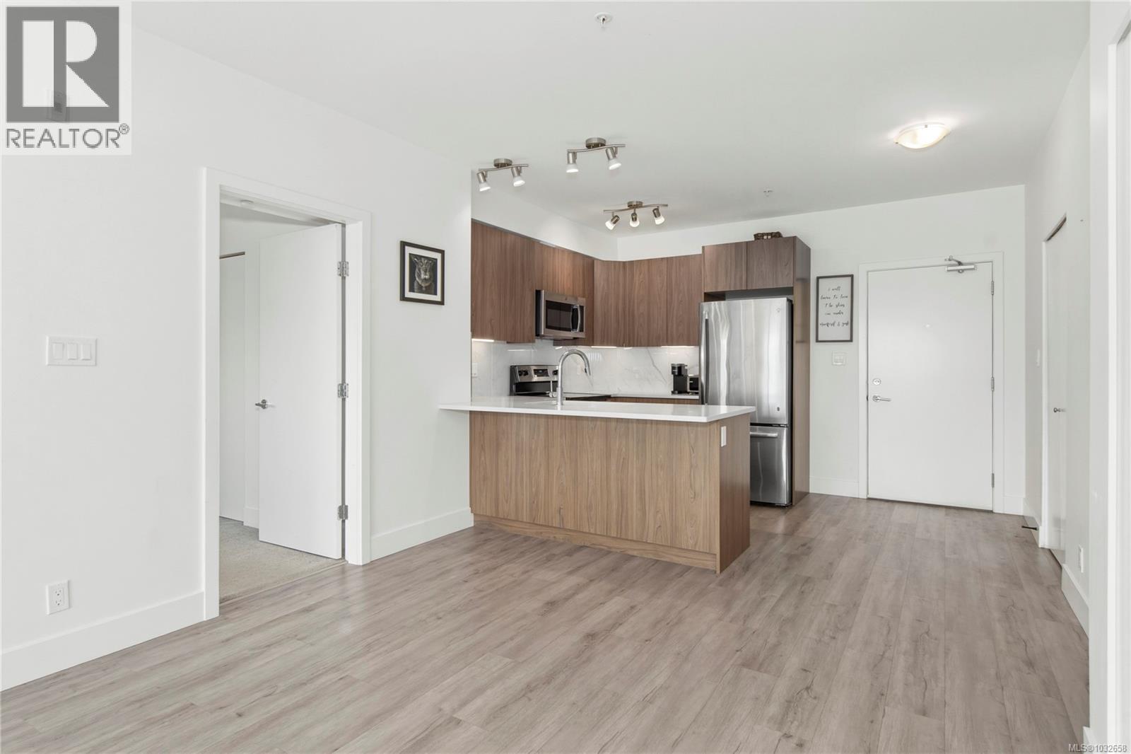305 3070 Kilpatrick Ave — photo 6