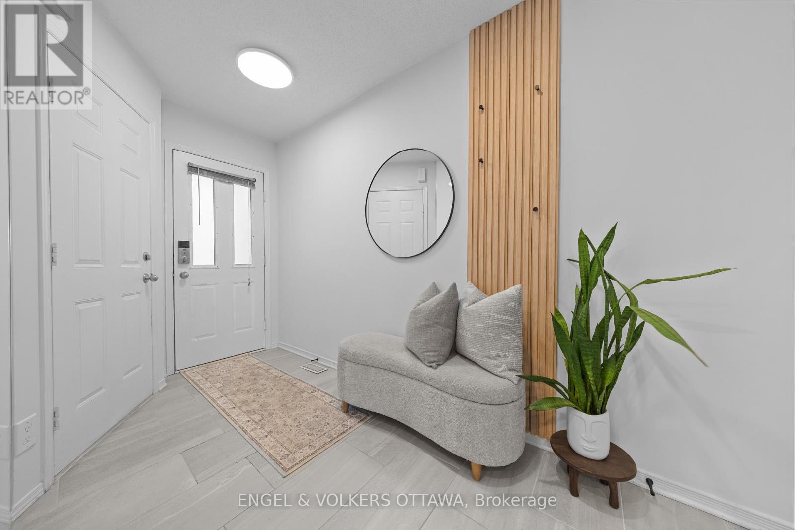 Spacious entryway with garage access and closet