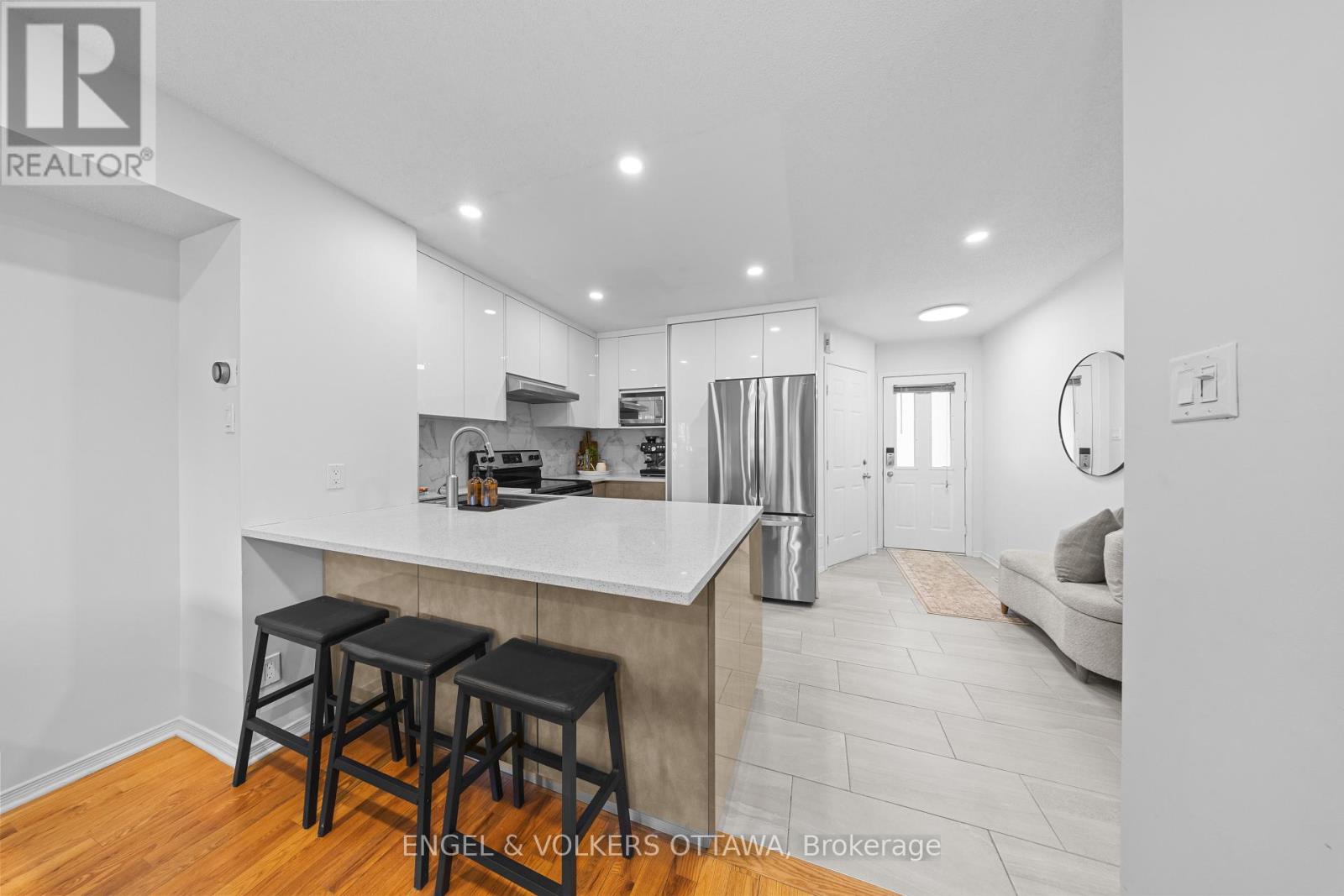 Thoughtfully renovated kitchen with eat-up island