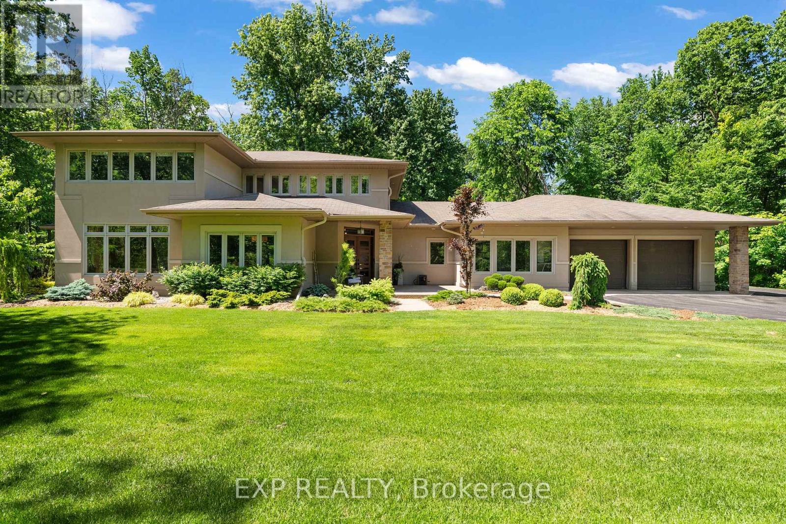 5759 Queenscourt Cres - front view