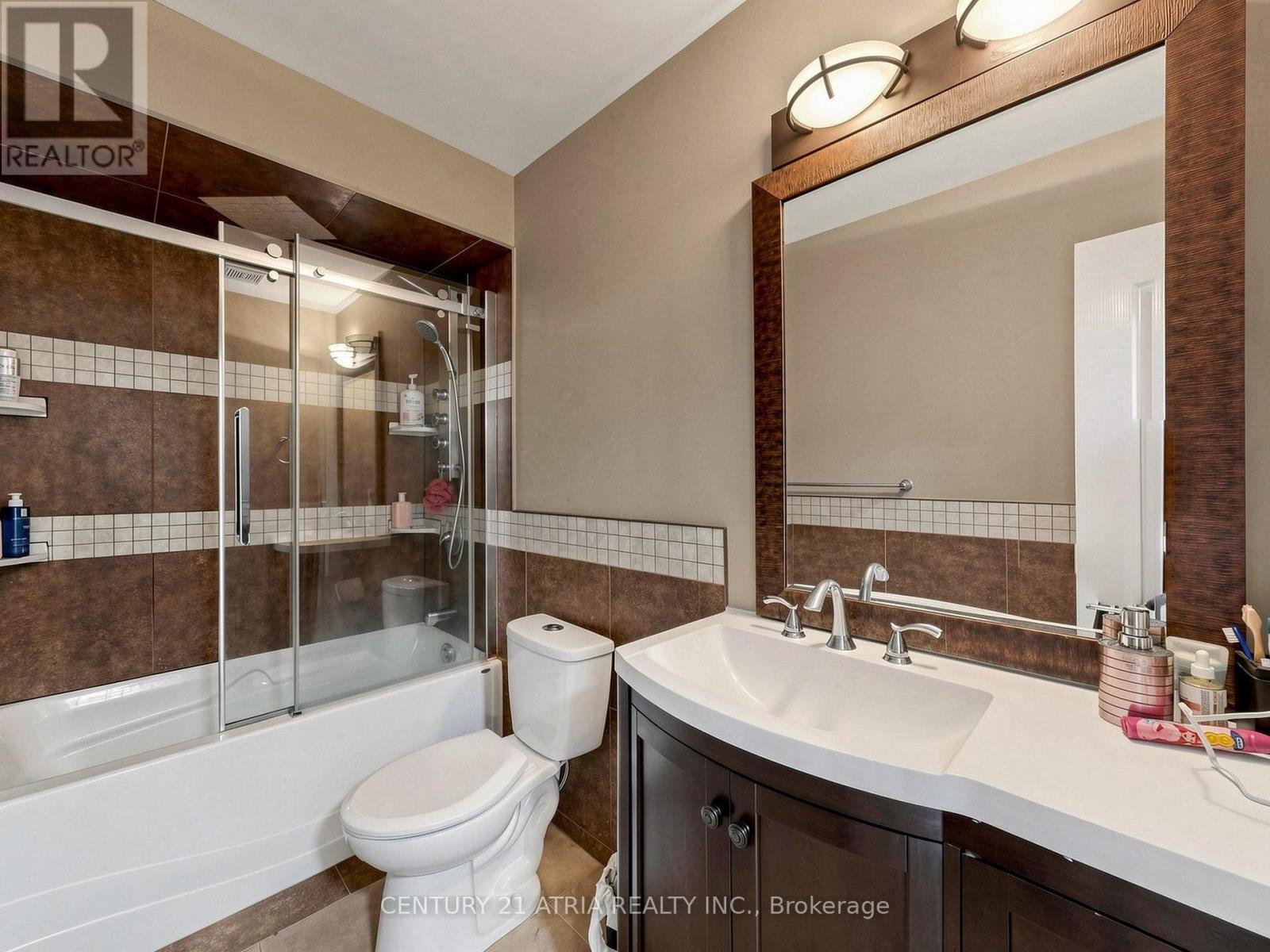 14 ROBERT ATTERSLEY DRIVE W - 34