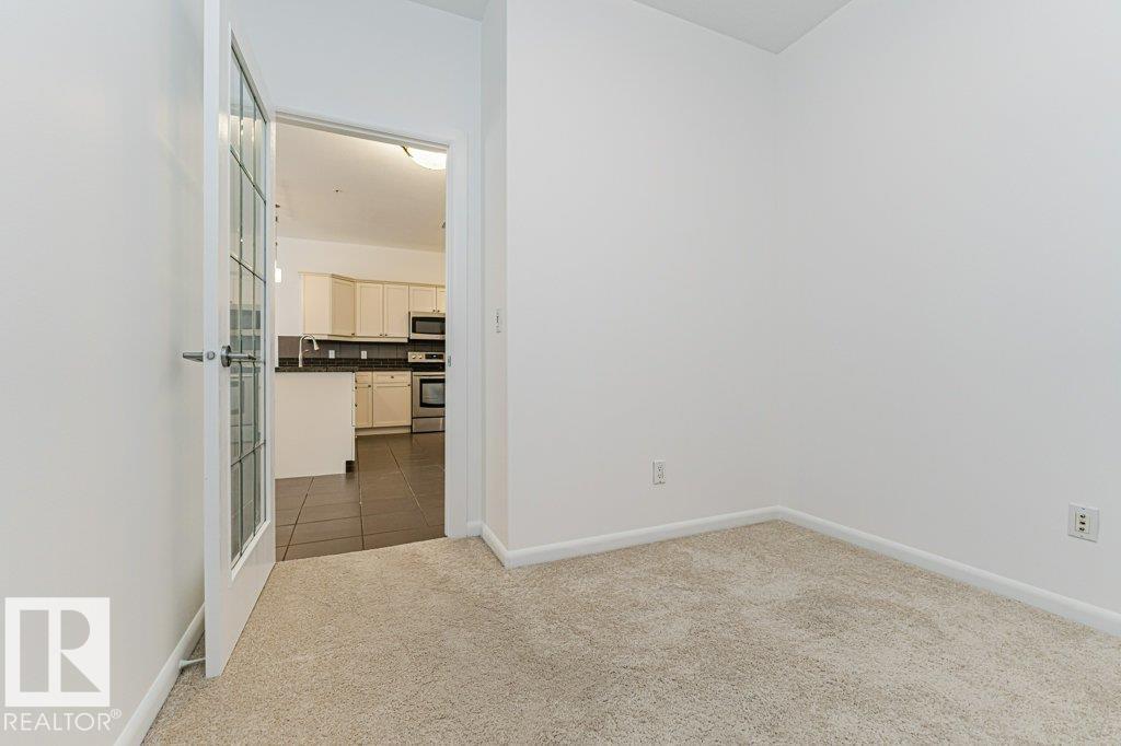 #302 160 MAGRATH RD NW - 32