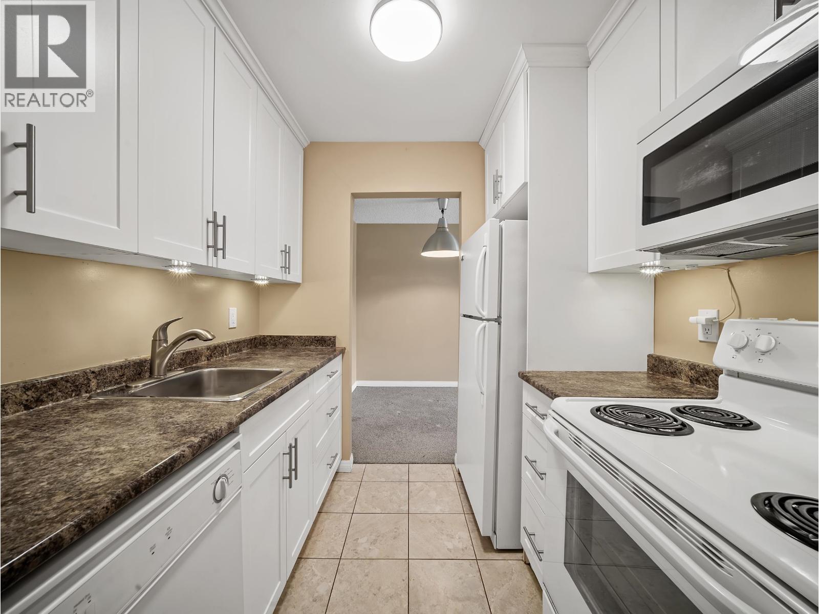 #210-8511 ACKROYD Road, Richmond