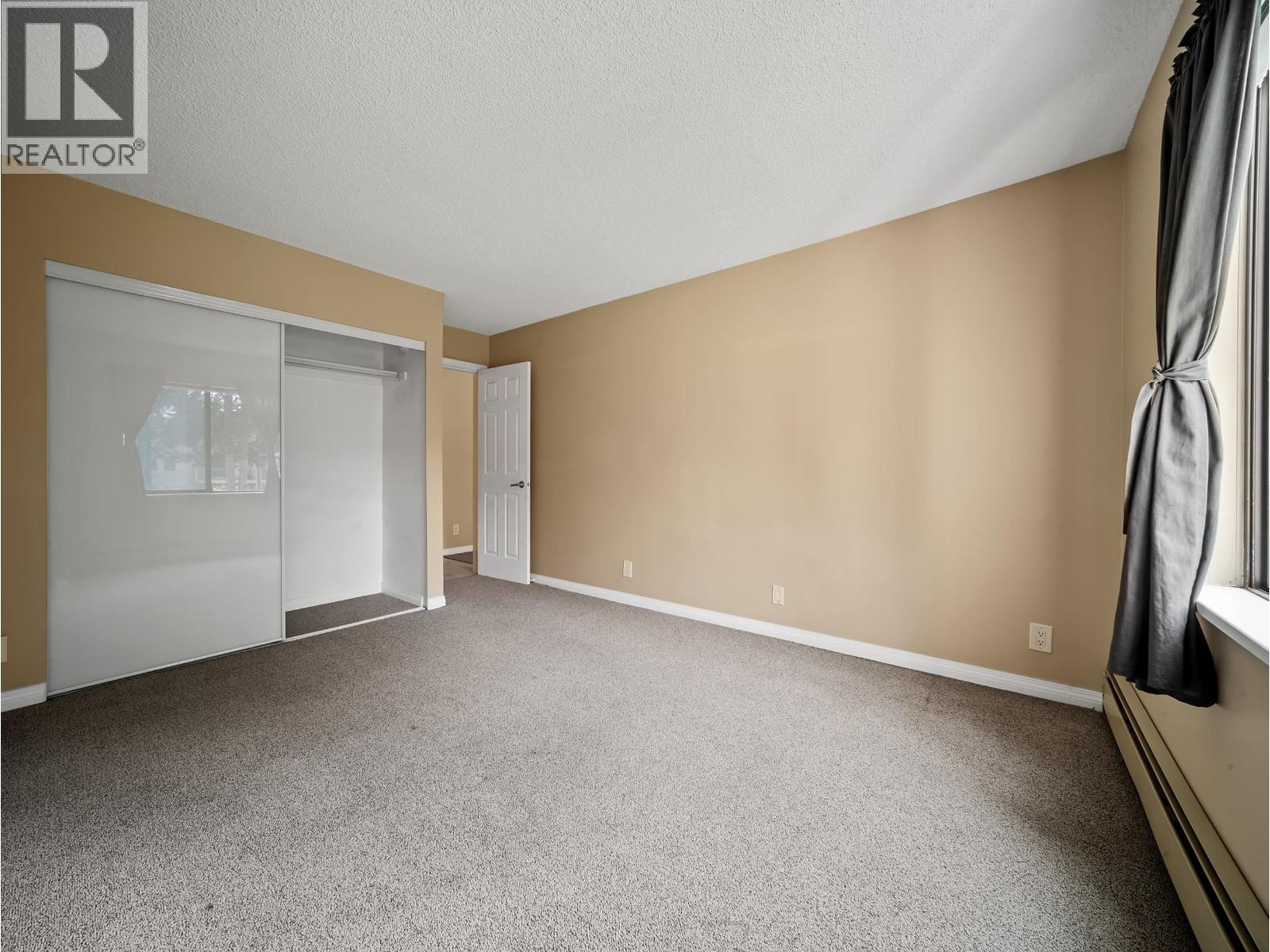 #210-8511 ACKROYD Road, Richmond