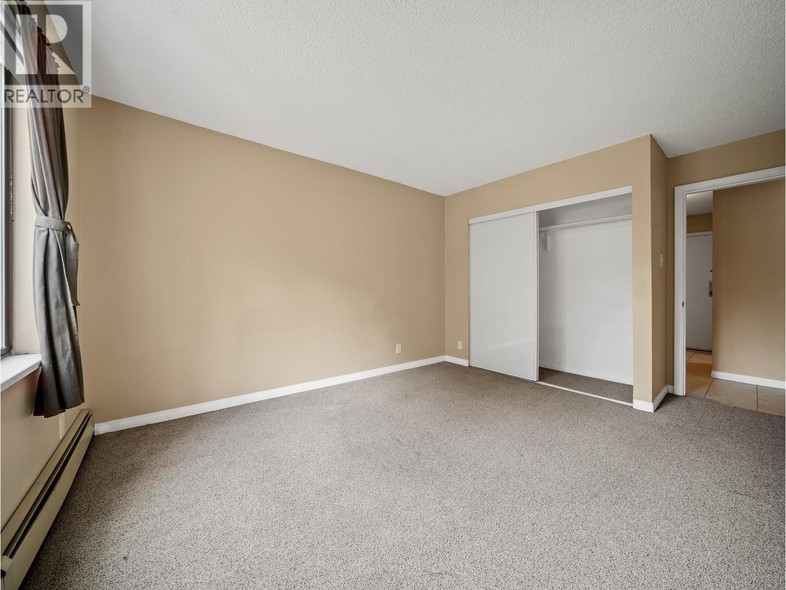 #210-8511 ACKROYD Road, Richmond