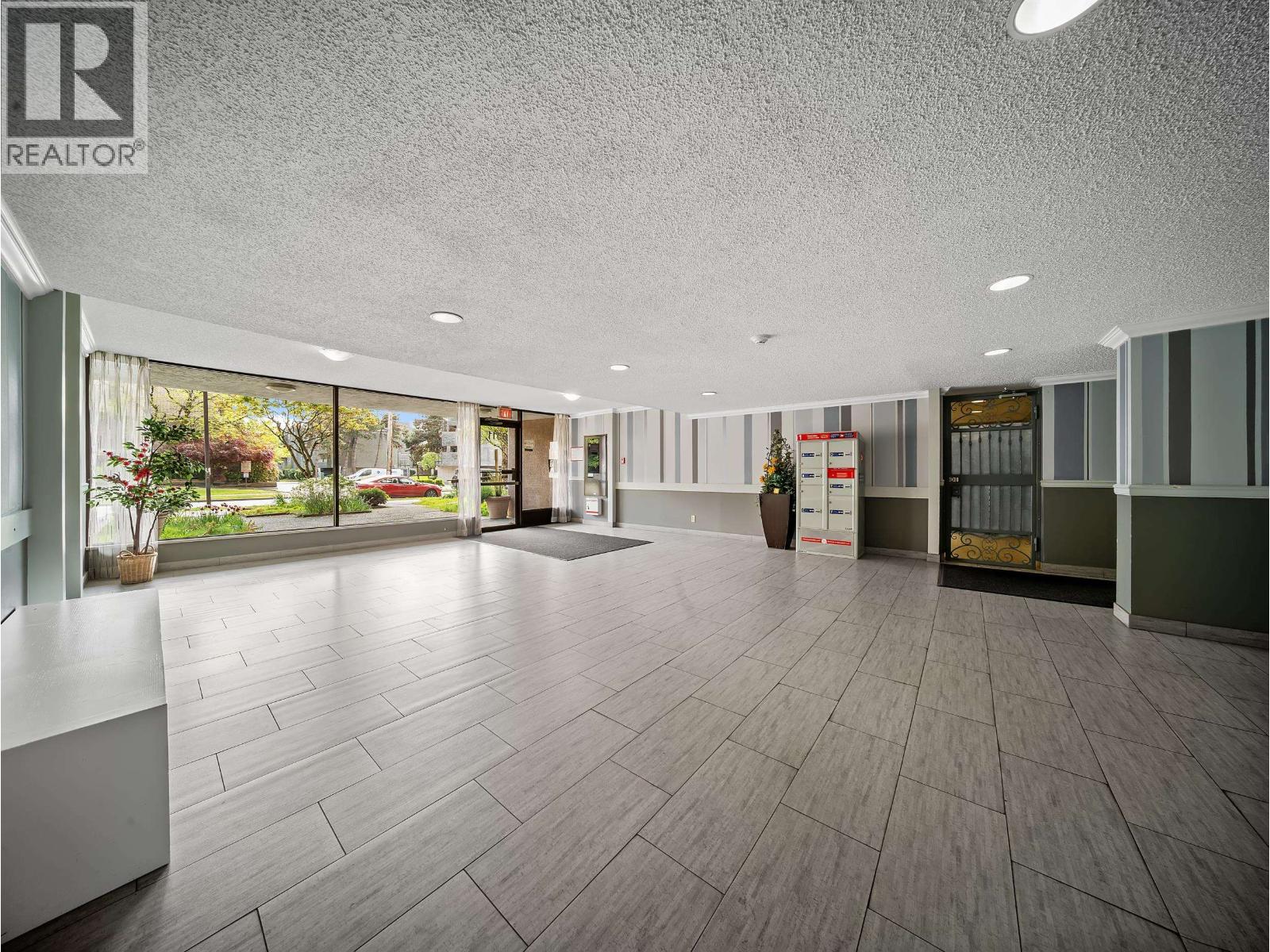 #210-8511 ACKROYD Road, Richmond