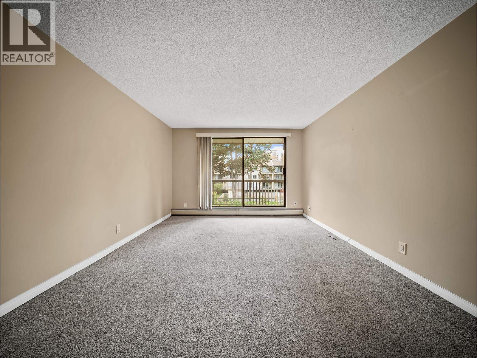 #210-8511 ACKROYD Road, Richmond