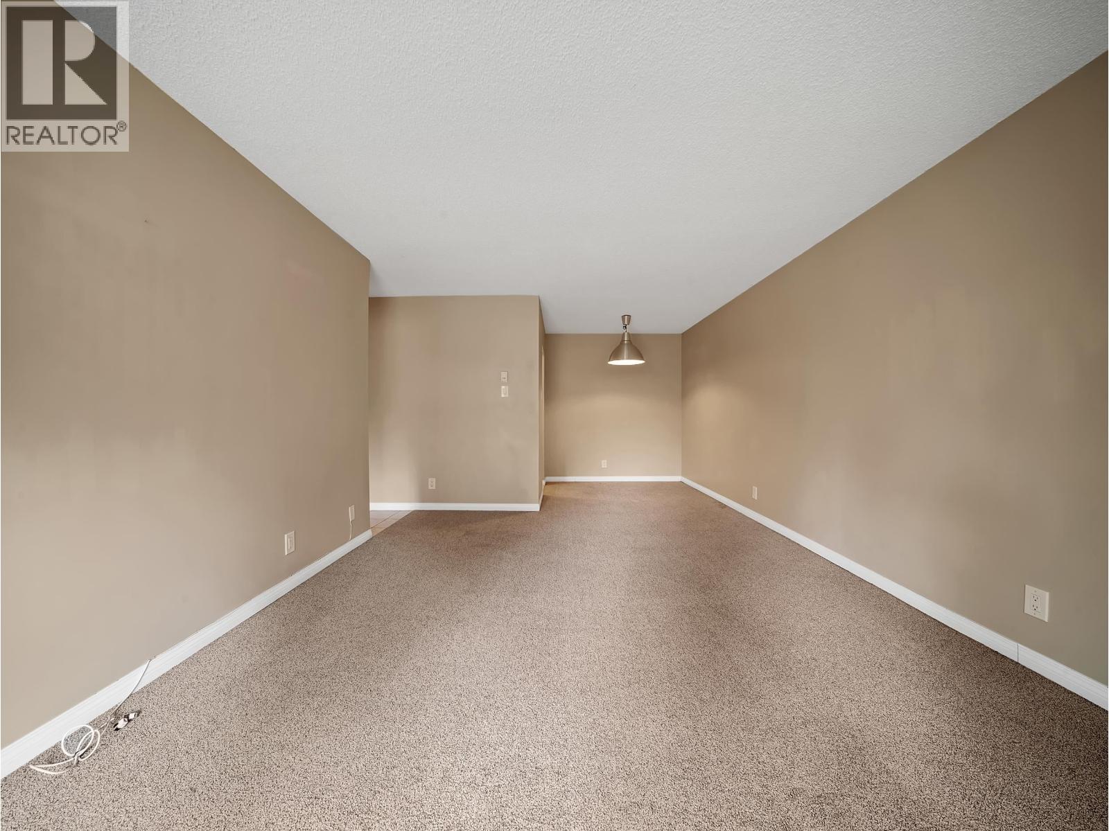 #210-8511 ACKROYD Road, Richmond