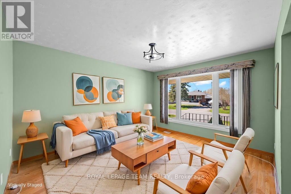 Living Room-Staged photo. (Main Floor)