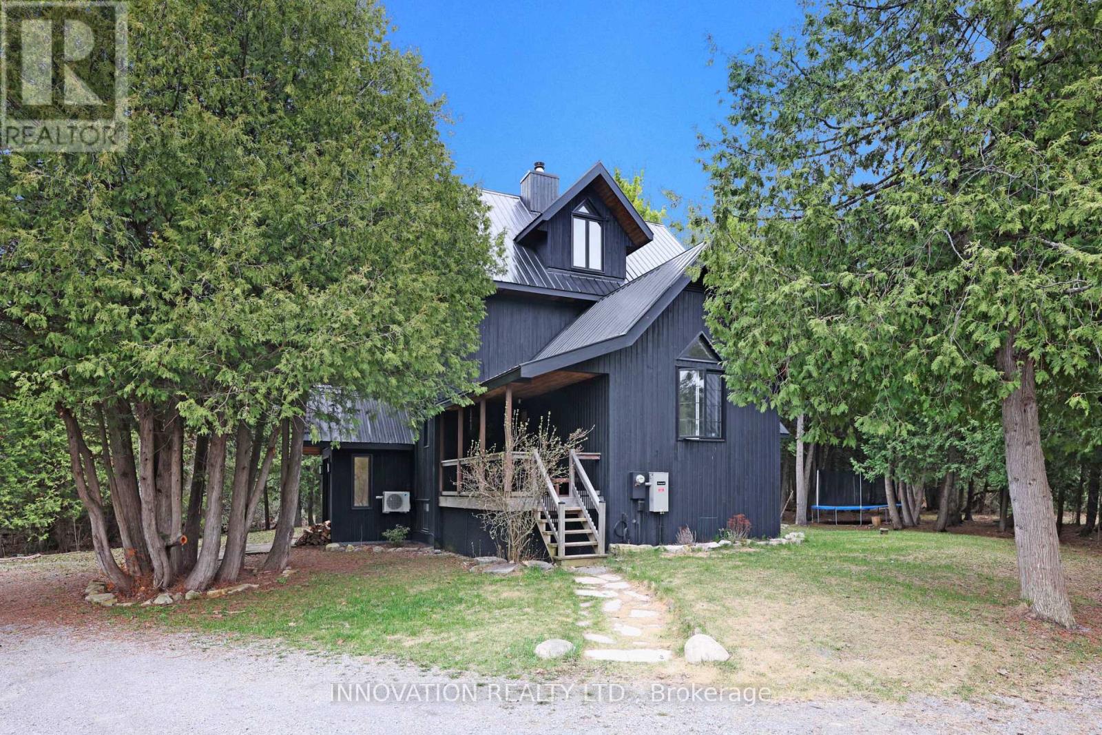 Nestled in the trees is this architectural gem.