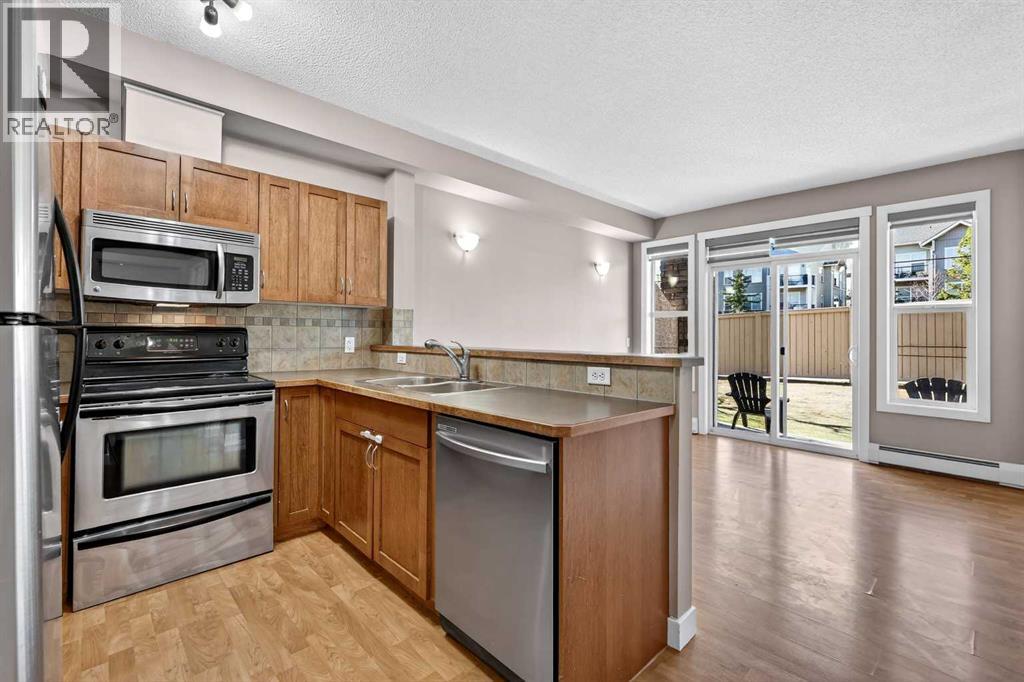 2101, 211 Aspen Stone Boulevard SW - photo 2
