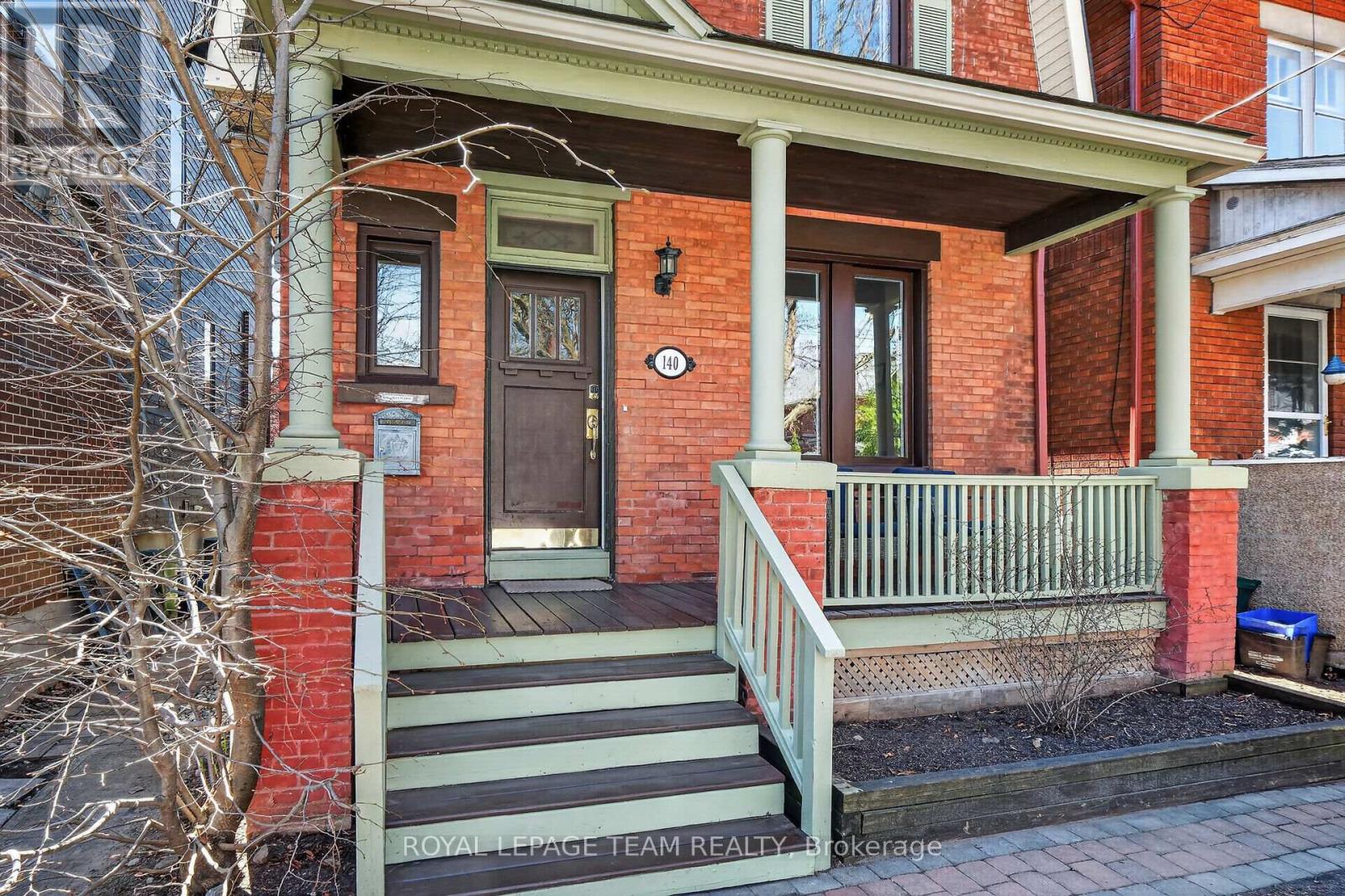Charming century red brick home with front porch