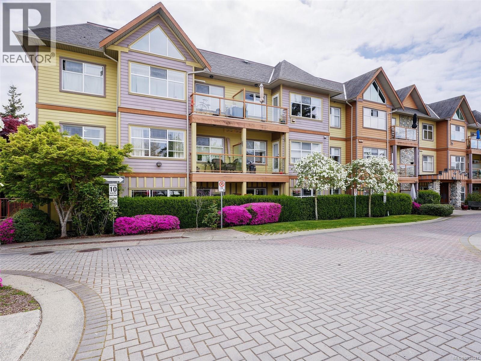 #101 1959 Polo Park Cres - 1