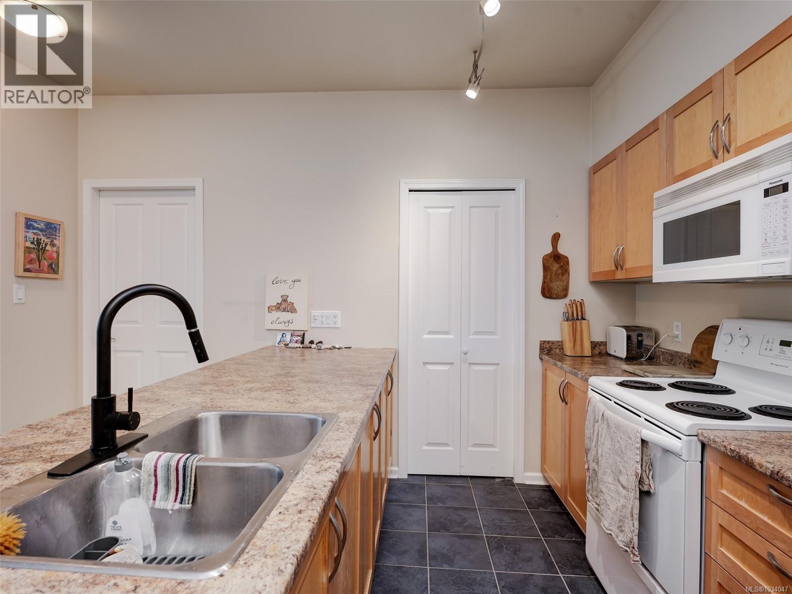 #101 1959 Polo Park Cres - 7