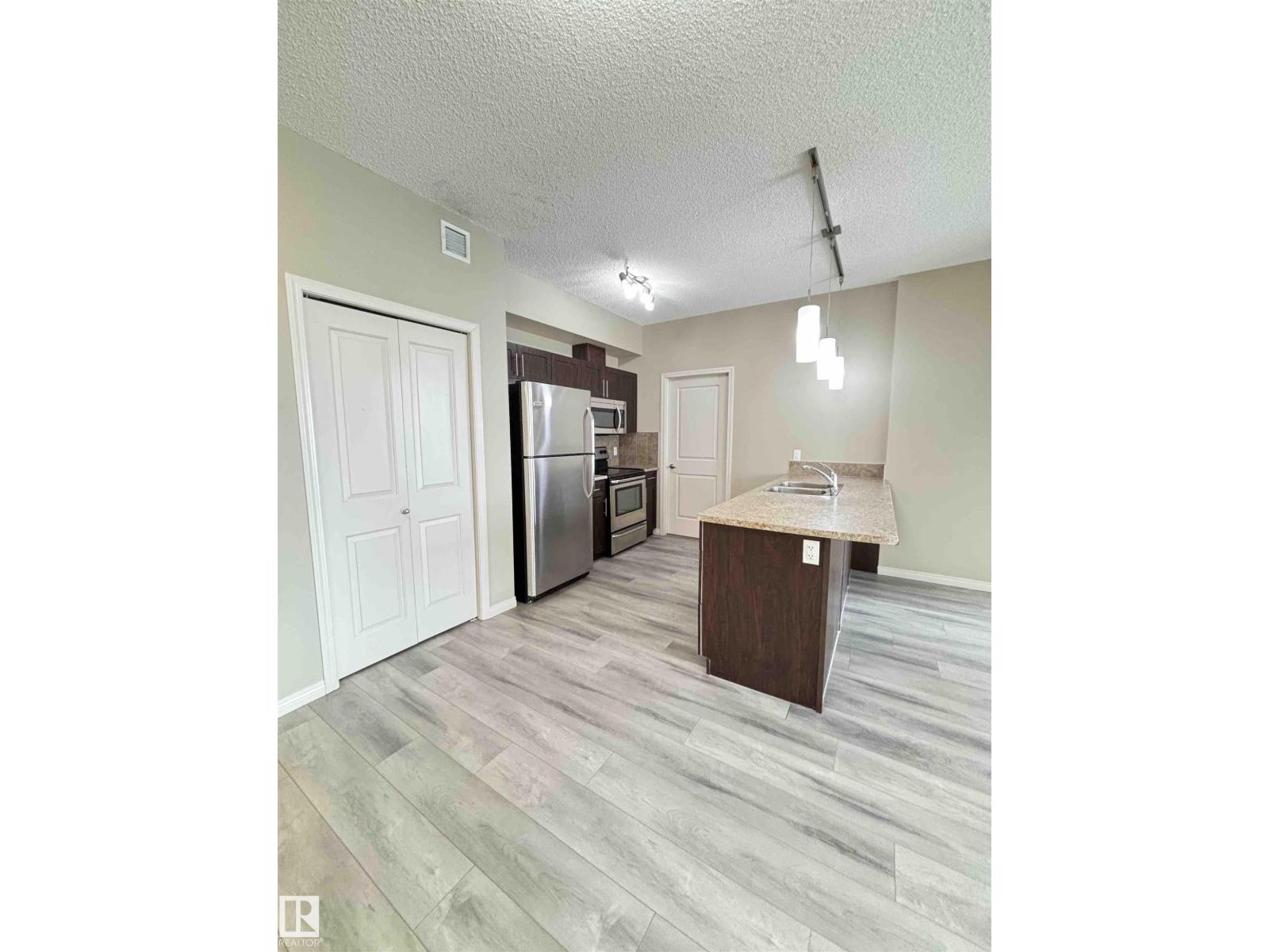 #408 111 AMBELSIDE DR SW SW - 2