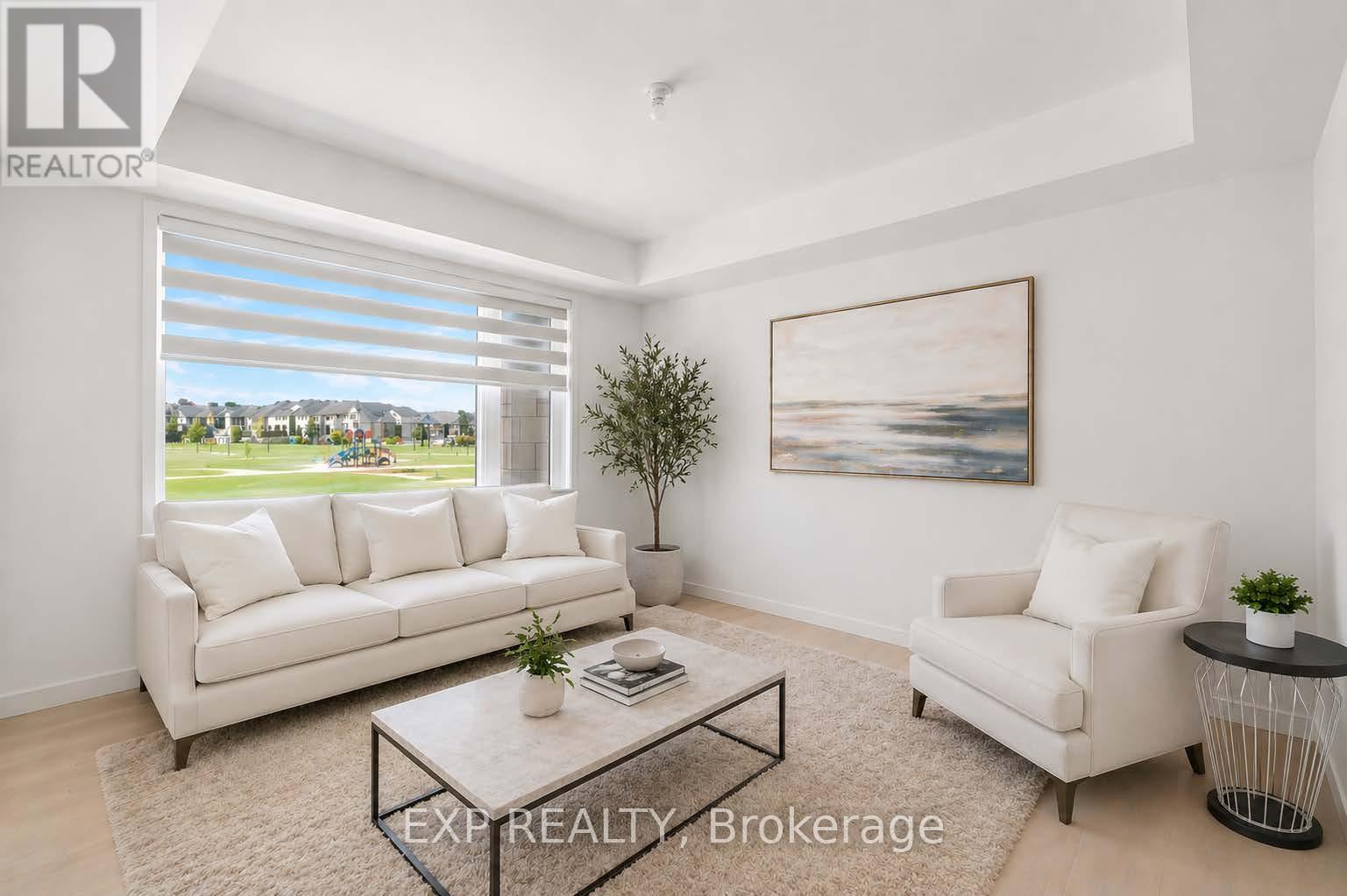 Lvng rm w/large window & hdwd flr virtually staged