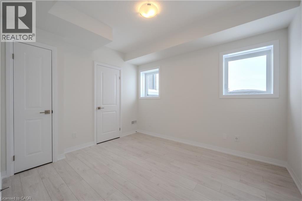 15 STAUFFER WOODS Trail Unit# A2, Kitchener, Ontario, N2P0L1 — Photo 14