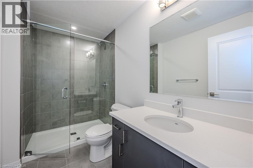 15 STAUFFER WOODS Trail Unit# A2, Kitchener, Ontario, N2P0L1 — Photo 17