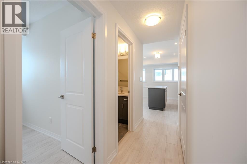 15 STAUFFER WOODS Trail Unit# A2, Kitchener, Ontario, N2P0L1 — Photo 6