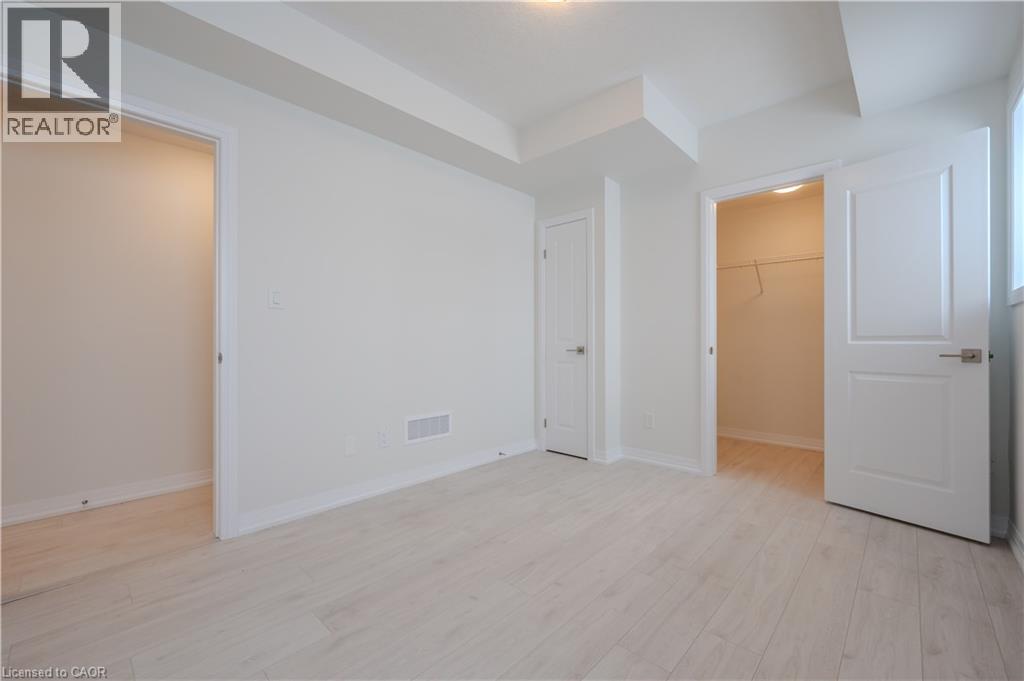 15 STAUFFER WOODS Trail Unit# A2, Kitchener, Ontario, N2P0L1 — Photo 15