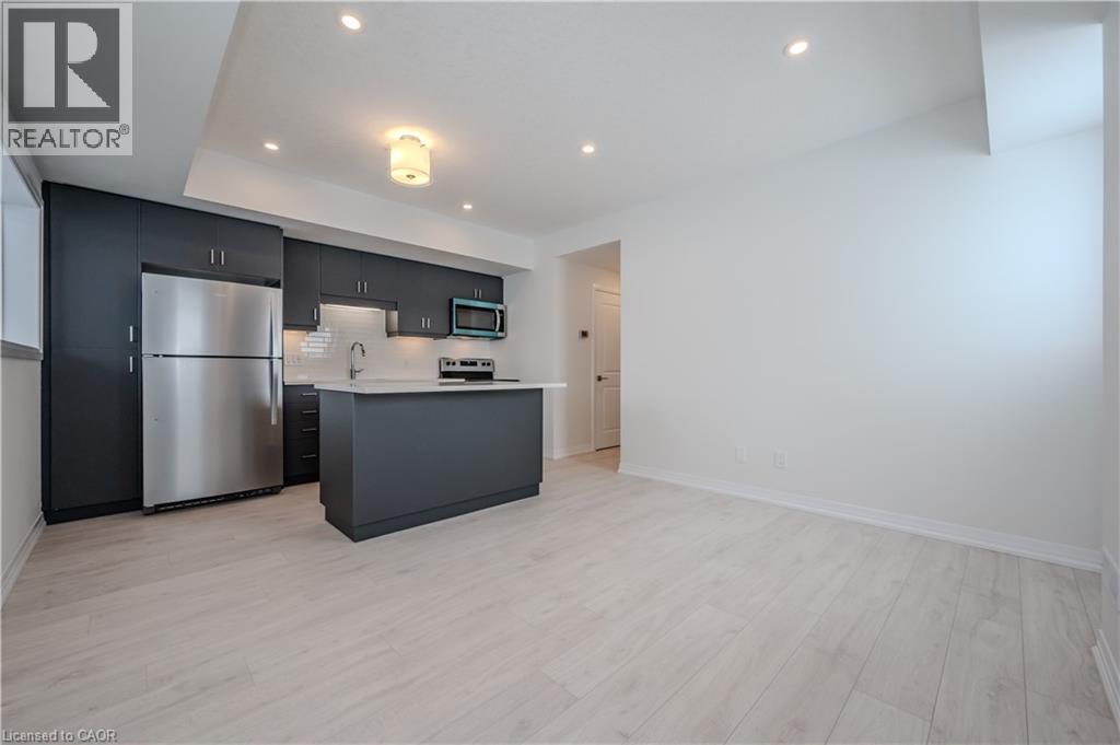 15 STAUFFER WOODS Trail Unit# A2, Kitchener, Ontario, N2P0L1 — Photo 9