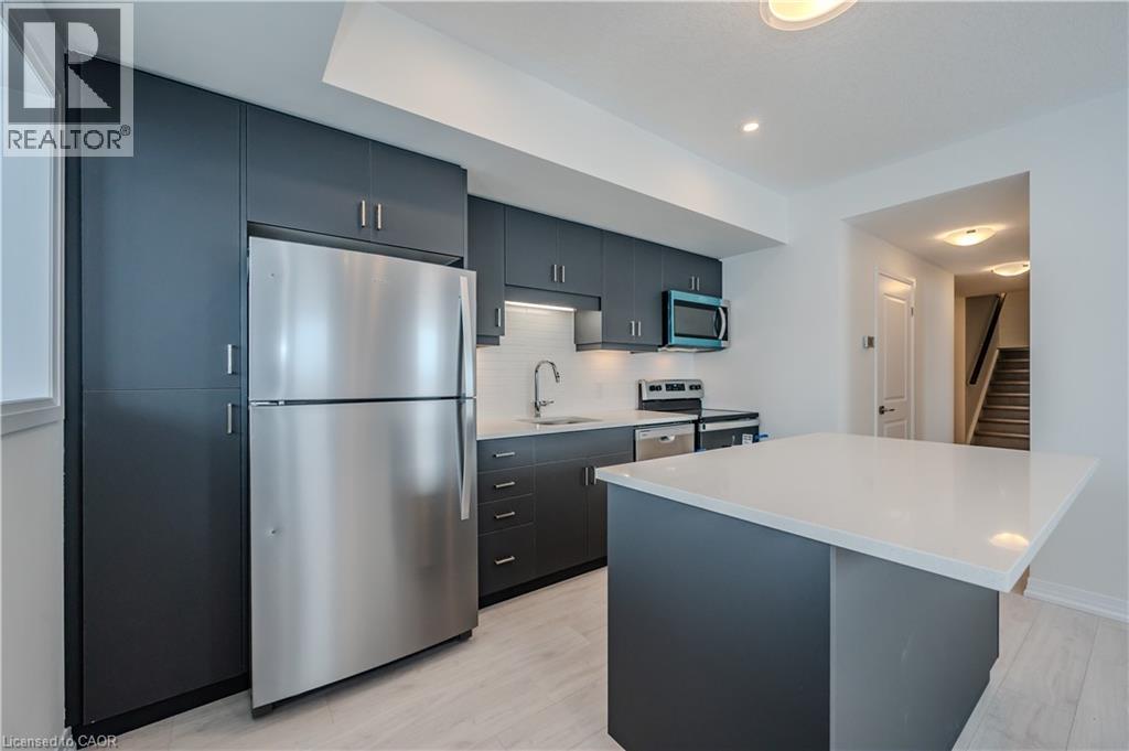 15 STAUFFER WOODS Trail Unit# A2, Kitchener, Ontario, N2P0L1 — Photo 13