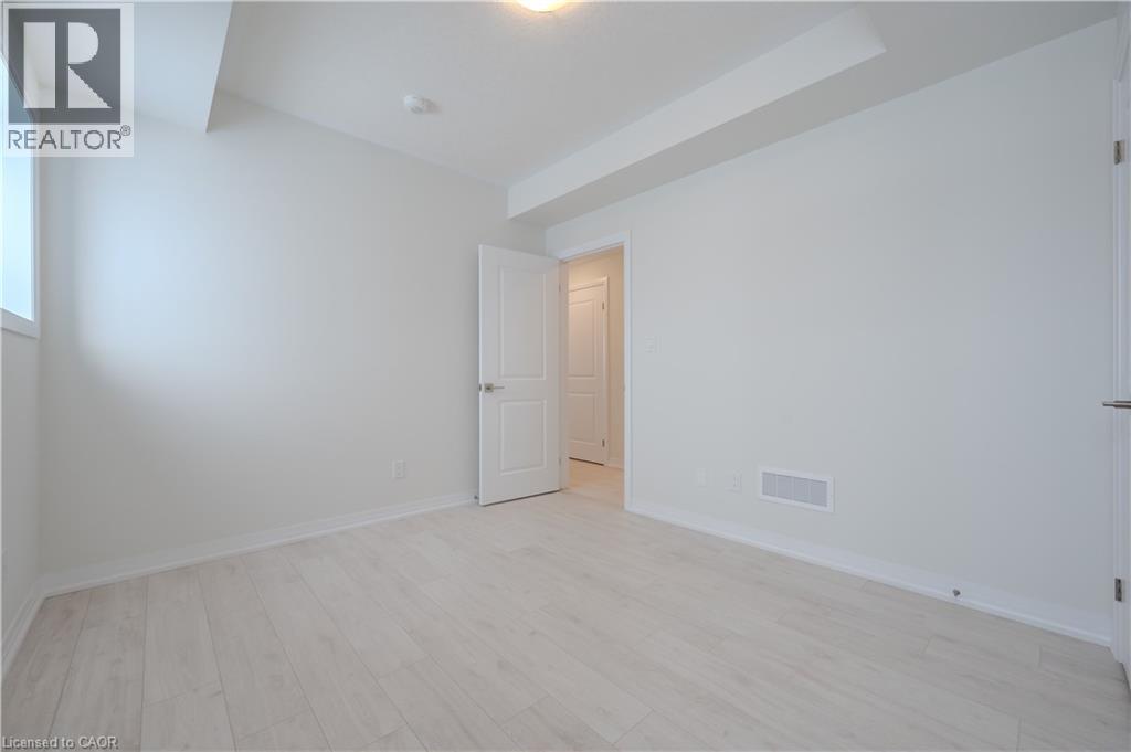 15 STAUFFER WOODS Trail Unit# A2, Kitchener, Ontario, N2P0L1 — Photo 16