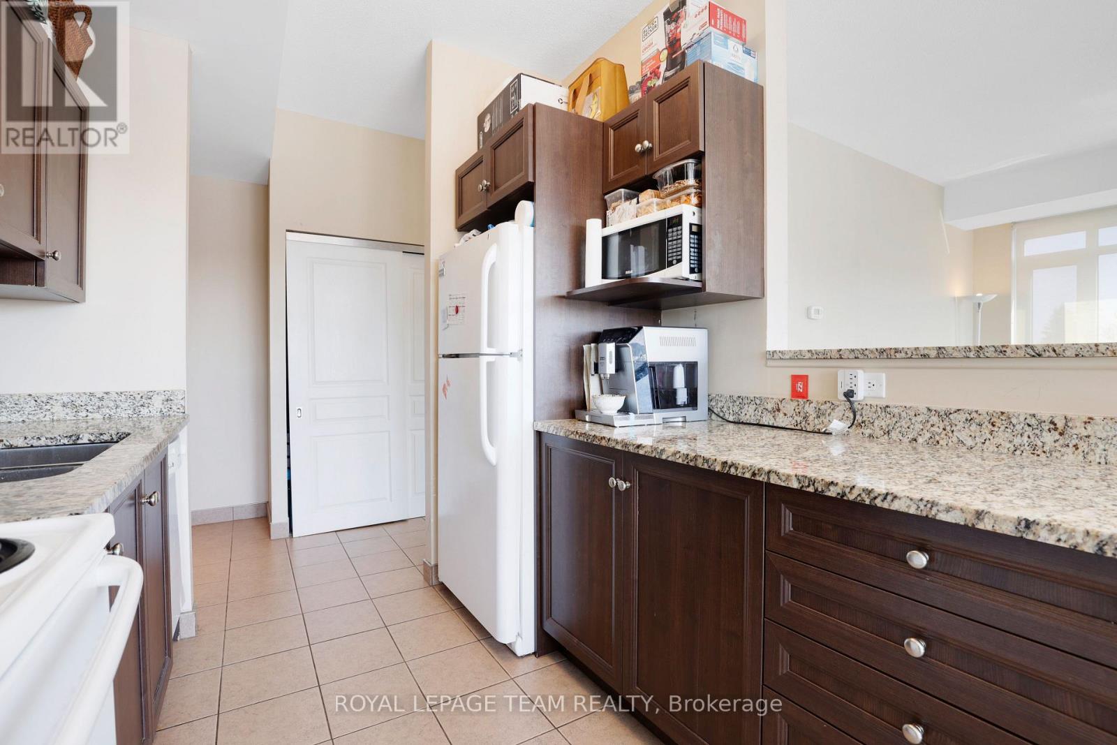 #202 100 ROGER GUINDON AVENUE - 13