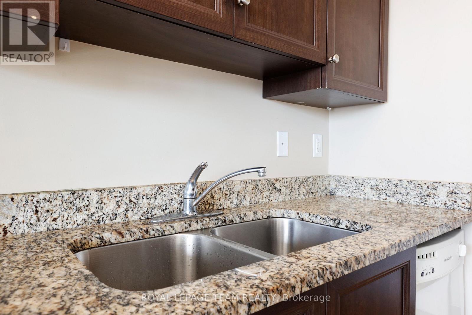 #202 100 ROGER GUINDON AVENUE - 14