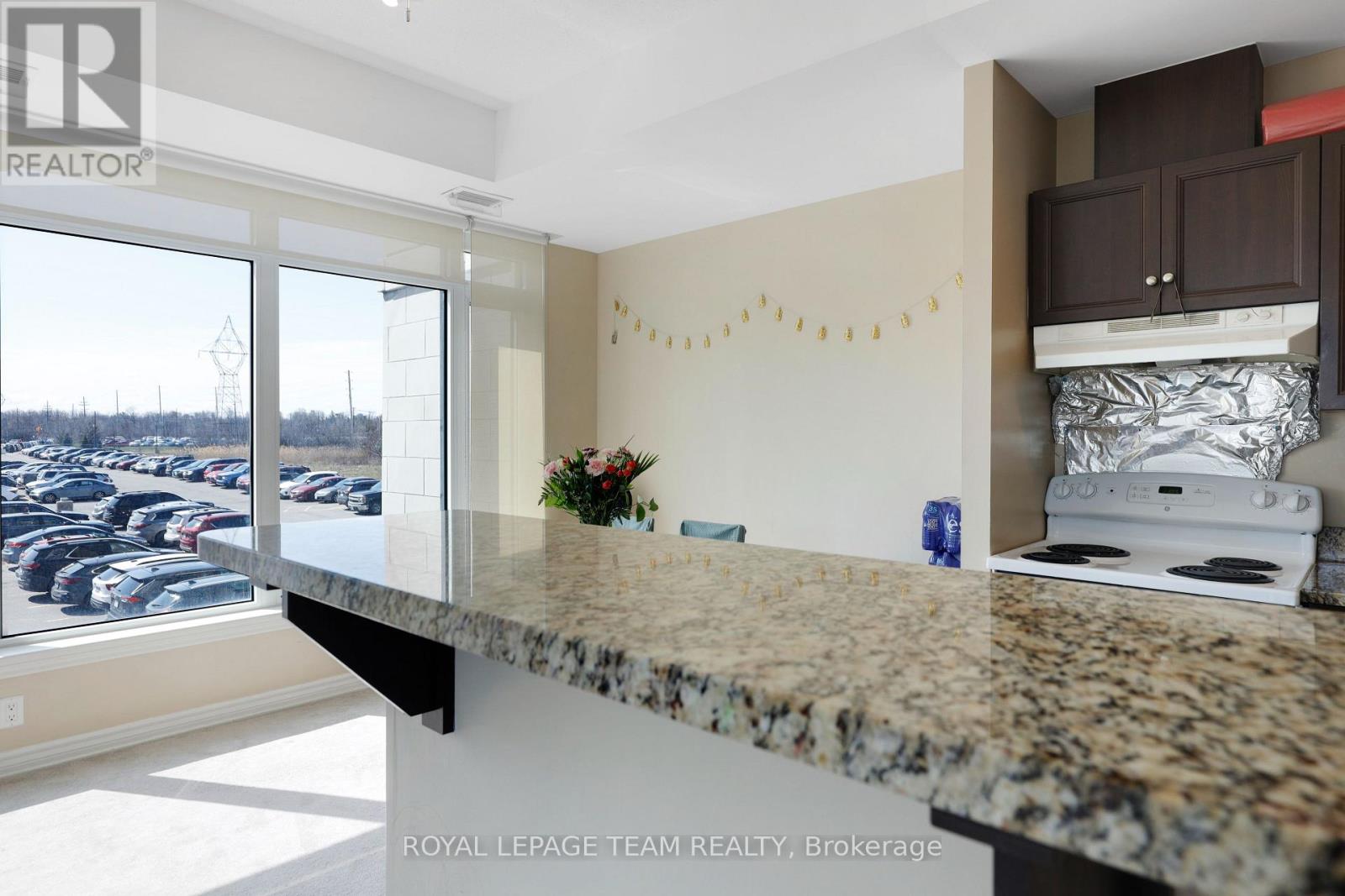 #202 100 ROGER GUINDON AVENUE - 21