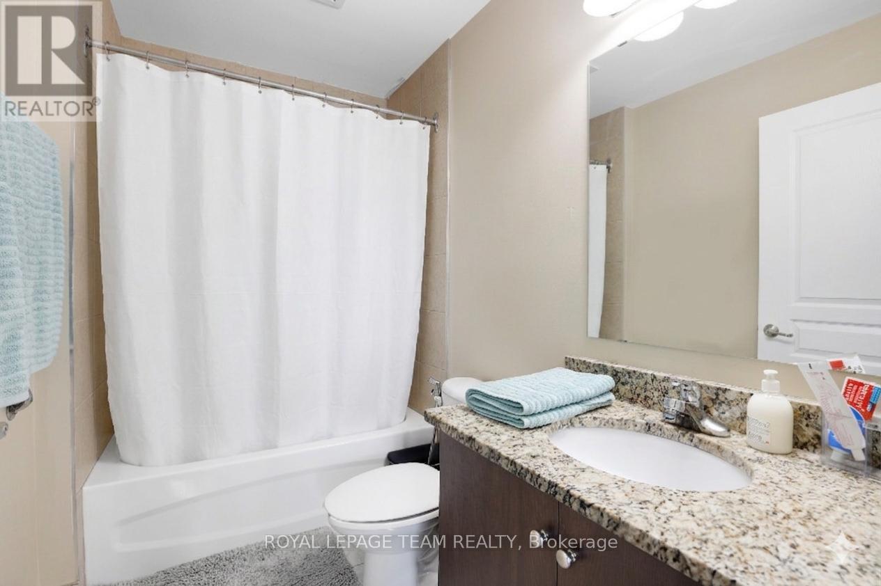 #202 100 ROGER GUINDON AVENUE - 30