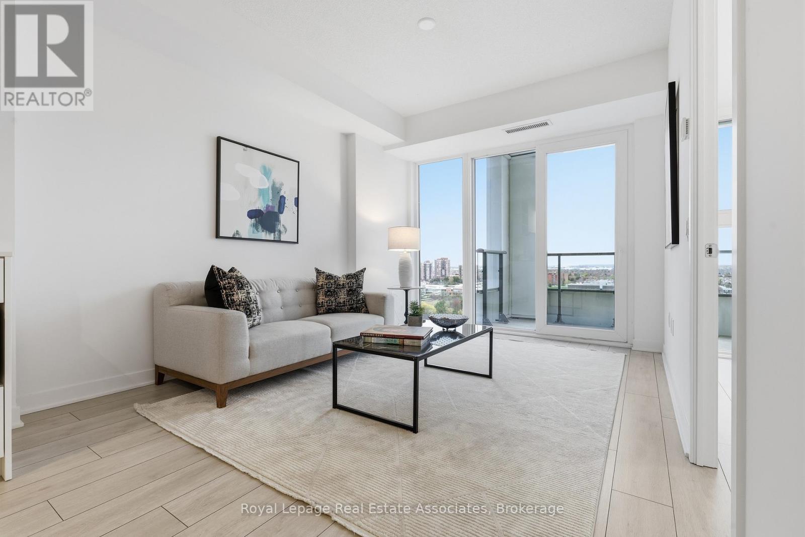 Living Room w/ Balcony Access