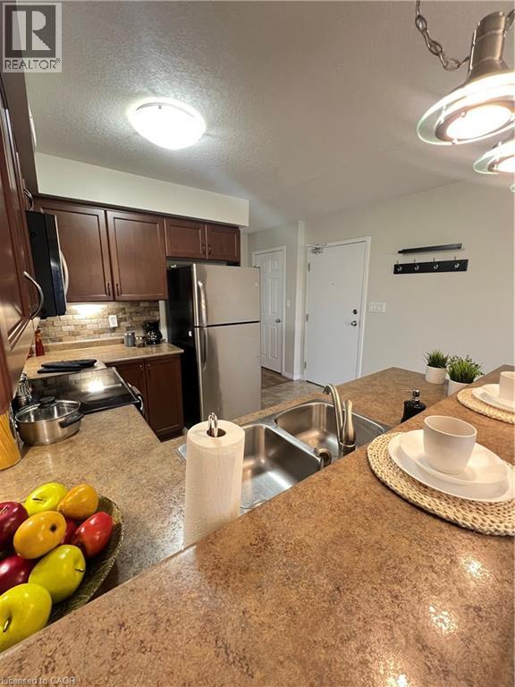35 MOUNTFORD Drive Unit# 111, Guelph, Ontario, N1E0G6 — Photo 4
