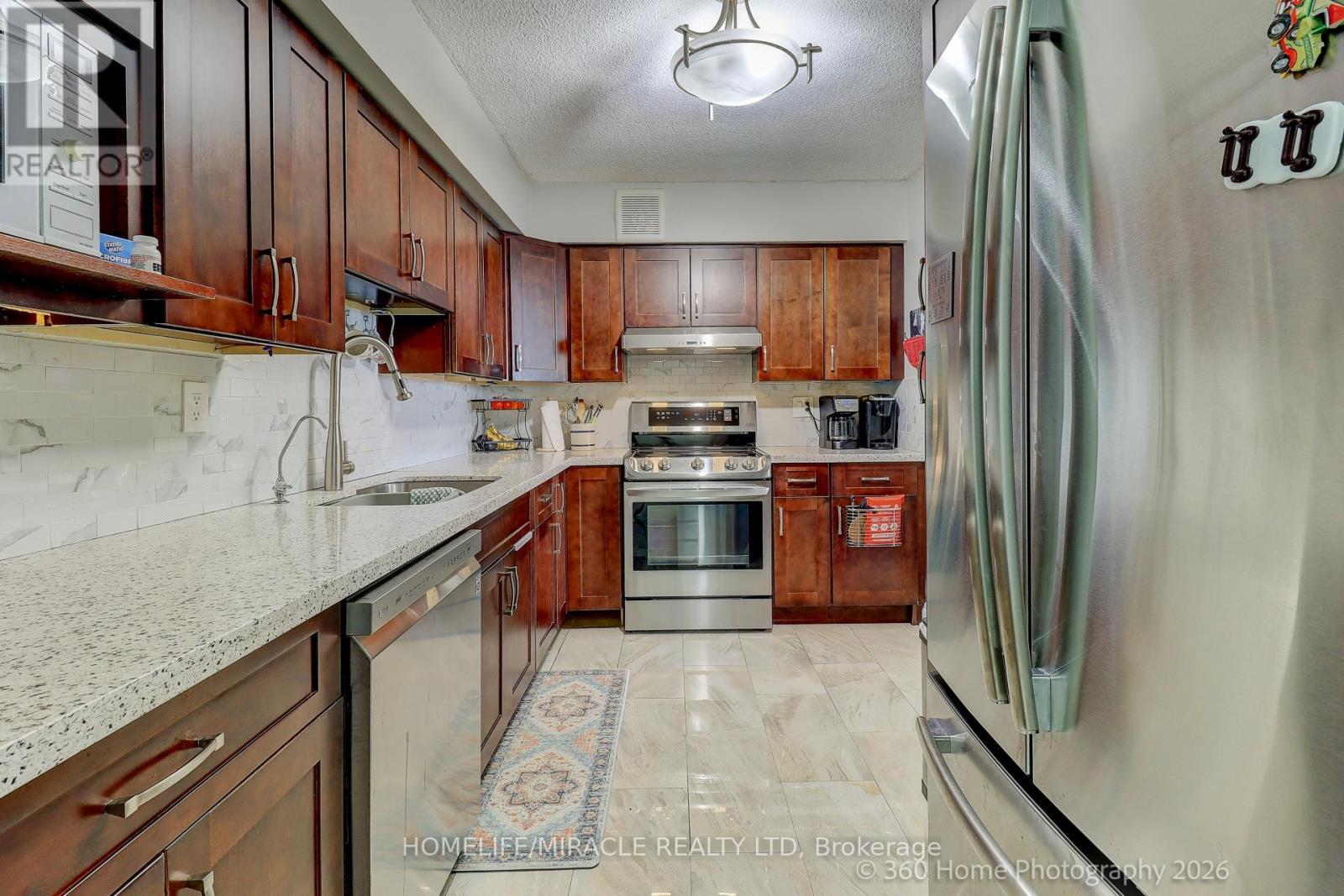 #909 3380 EGLINTON AVENUE E - 8