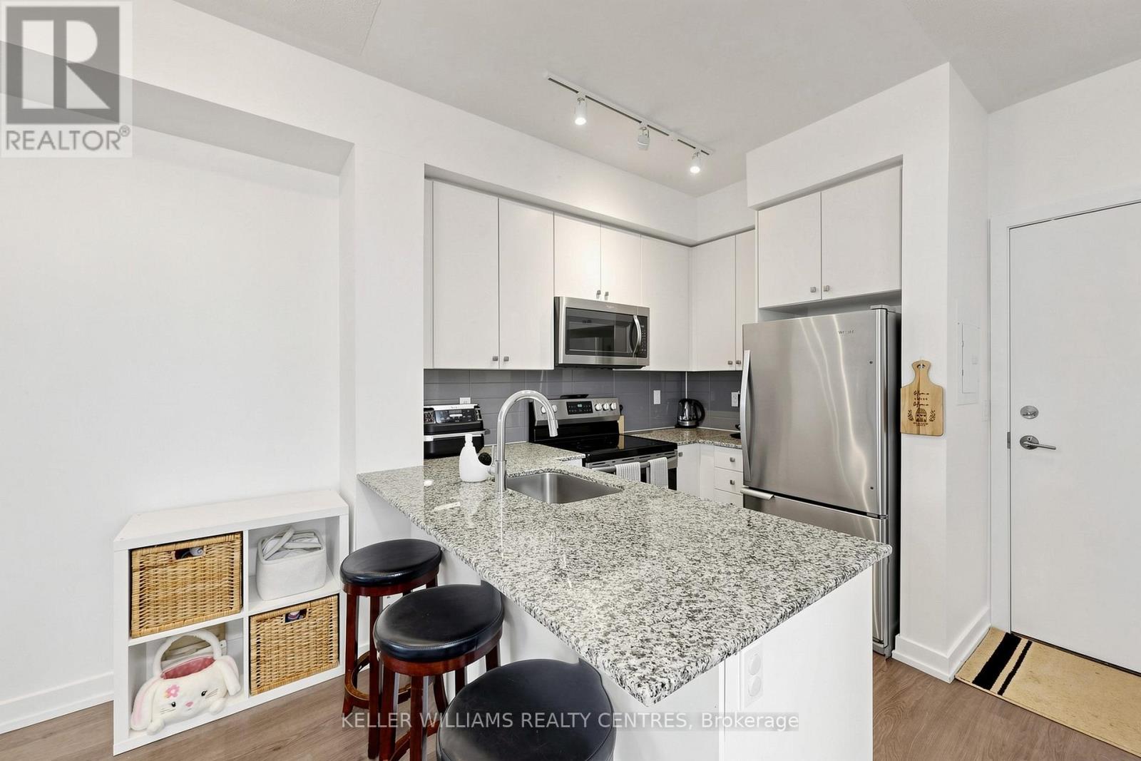 #101 555 WILLIAM GRAHAM DRIVE - 13